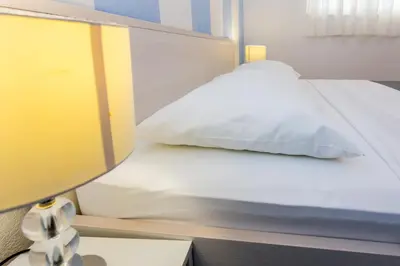 Krevet ili kreveti u jedinici u objektu Apartments Magdales