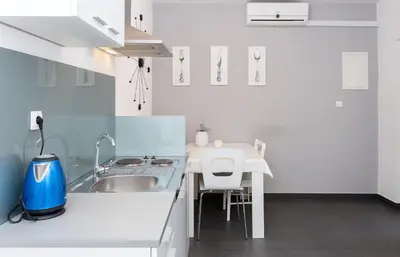 Kuhinja ili čajna kuhinja u objektu Apartments Magdales