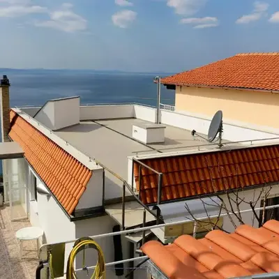 Apartments with a parking space Omis - 10349
