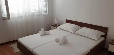 Krevet ili kreveti u jedinici u objektu Seaside holiday house Nemira, Omis - 9504