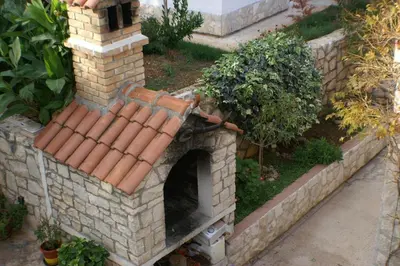 Vrt u objektu Apartments with a swimming pool Splitska, Brac - 2889