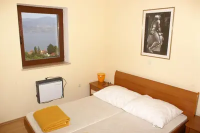 Krevet ili kreveti u jedinici u objektu Apartments with a swimming pool Splitska, Brac - 2889