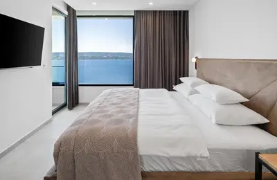 Krevet ili kreveti u jedinici u objektu NEW! Villa Angelus – Your Luxurious Retreat near the Sea