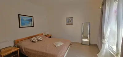 Krevet ili kreveti u jedinici u objektu Beach front with Swimming Pool, Illyria Resort Apt 102