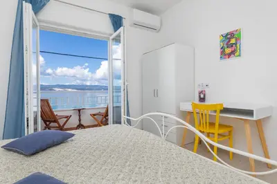 Krevet ili kreveti u jedinici u objektu Apartments Ljiljana