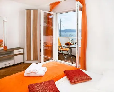 Krevet ili kreveti u jedinici u objektu Apartments Ljiljana