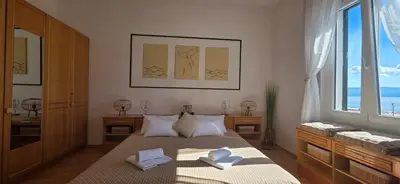Krevet ili kreveti u jedinici u objektu Beach Side Holiday