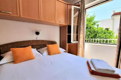 Krevet ili kreveti u jedinici u objektu Apartments Roso - ZF Hvar