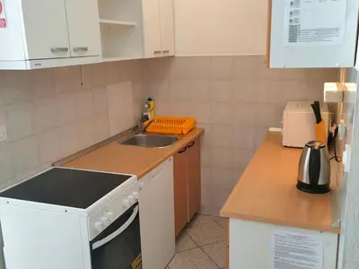 Kuhinja ili čajna kuhinja u objektu Two Bedroom Apartment with Terrace no 1