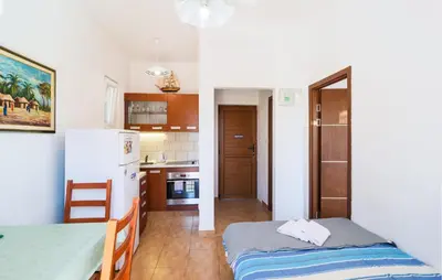 Krevet ili kreveti u jedinici u objektu Lovely Apartment In Omis With House Sea View
