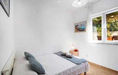 Krevet ili kreveti u jedinici u objektu 1 Bedroom Awesome Apartment In Omis