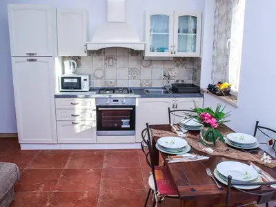 Kuhinja ili čajna kuhinja u objektu Apartments by the sea Postira, Brac - 24897