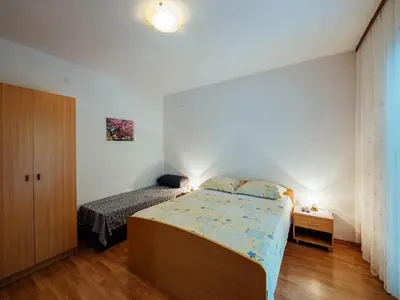 Krevet ili kreveti u jedinici u objektu Apartments Pezo - Studio apartment with Terrace Tina 4