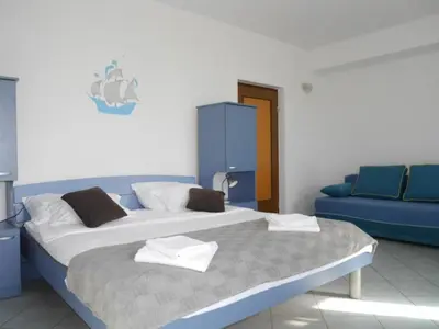 Krevet ili kreveti u jedinici u objektu Dugi Rat Seaside Apartments - Studio Apartment 2