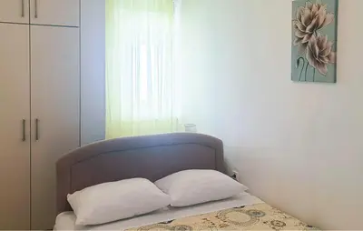 Krevet ili kreveti u jedinici u objektu Lovely Apartment In Omis With Wifi