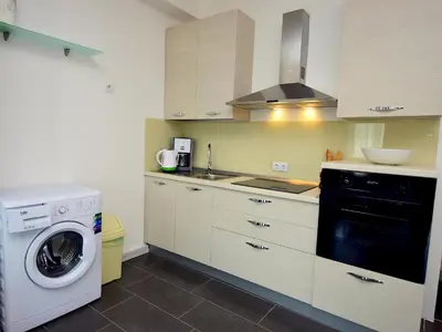 Kuhinja ili čajna kuhinja u objektu Apartment Molo Lozna-3 by Interhome