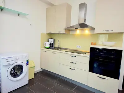 Kuhinja ili čajna kuhinja u objektu Apartment Molo Lozna-5 by Interhome