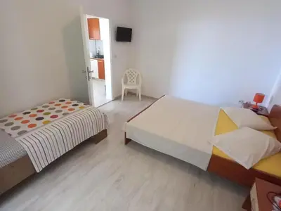 Krevet ili kreveti u jedinici u objektu Classic One Bedroom Apartment with Terrace and Sea view