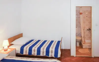 Krevet ili kreveti u jedinici u objektu 3 Bedroom Gorgeous Apartment In Omis