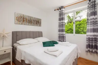 Krevet ili kreveti u jedinici u objektu Magic apartments with shared terrace
