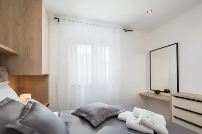 Krevet ili kreveti u jedinici u objektu La Suite Apartment