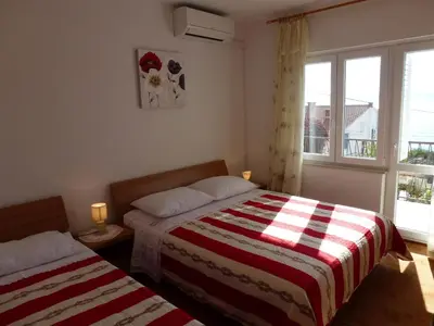 Krevet ili kreveti u jedinici u objektu Seaview Family Apartment with Grand Terrace