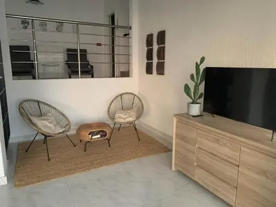 TV i/ili zabavni centar u objektu Carpe Diem - XL Apartments with Pool and Seaview