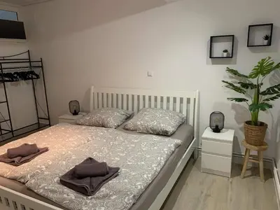 Krevet ili kreveti u jedinici u objektu Carpe Diem - XL Apartments with Pool and Seaview