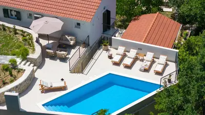 Bazen u objektu NEW! Villa AmaRosa - with heated pool and large playground ili u blizini