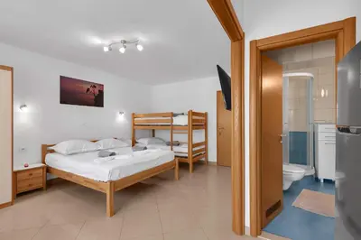 Krevet ili kreveti u jedinici u objektu Pine Canopy Studios and Apartments