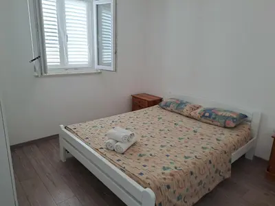 Krevet ili kreveti u jedinici u objektu Nane Garden house with heat pool