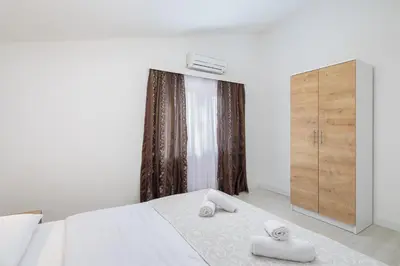 Krevet ili kreveti u jedinici u objektu Knez Penthouse Apartment