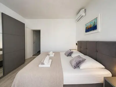 Krevet ili kreveti u jedinici u objektu New! Apartment Complex 