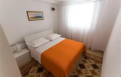 Krevet ili kreveti u jedinici u objektu 1 Bedroom Stunning Apartment In Podstrana