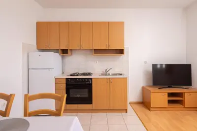Kuhinja ili čajna kuhinja u objektu WavePoint Apartment