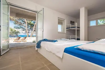 Krevet ili kreveti u jedinici u objektu Villa Hvarisca