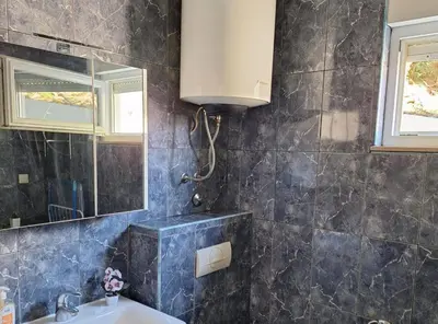Kupaonica u objektu Apartment Beleca
