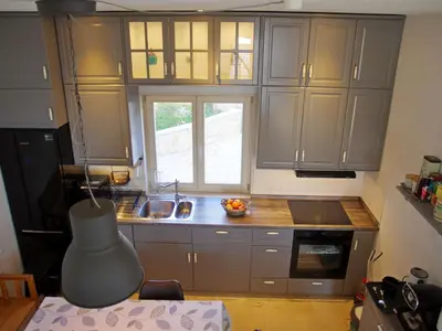 Kuhinja ili čajna kuhinja u objektu Holiday Home Schönes Ferienhaus mit privatem Pool by Interhome