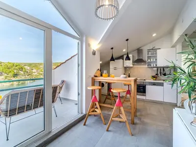 Kuhinja ili čajna kuhinja u objektu Holiday Home Villa Tudor mit atemberaubender Aussicht by Interhome
