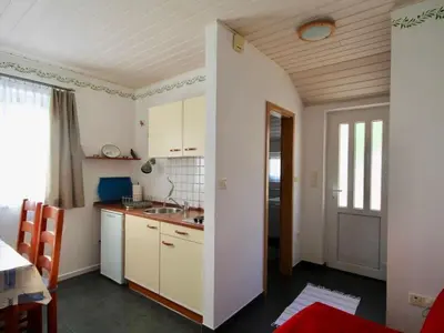 Kuhinja ili čajna kuhinja u objektu Apartment Wohnung in Bol by Interhome