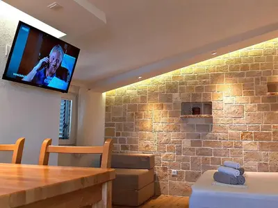 TV i/ili zabavni centar u objektu Apartment in Baška Voda by Interhome