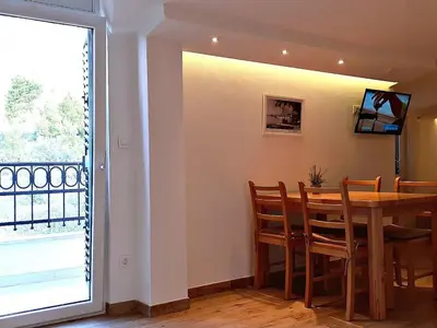 TV i/ili zabavni centar u objektu Apartment in Baška Voda by Interhome