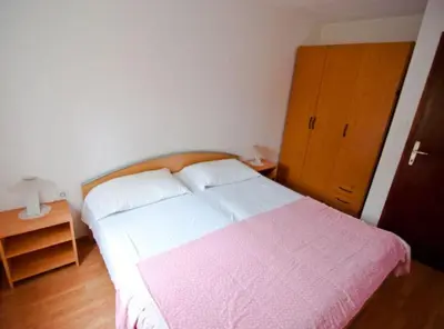 Krevet ili kreveti u jedinici u objektu Apartman Olive Garden