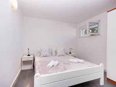 Krevet ili kreveti u jedinici u objektu Holiday Home Haus in Splitska mit kostenlosem Parkplatz by Interhome