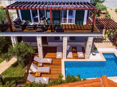 Bazen u objektu Holiday Home Haus in Stanići mit grünem Garten by Interhome ili u blizini