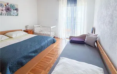Krevet ili kreveti u jedinici u objektu Cozy Apartment In Necujam With House Sea View