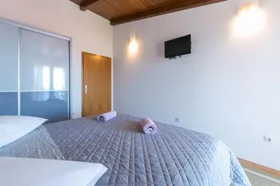 Krevet ili kreveti u jedinici u objektu Apartmani Nede