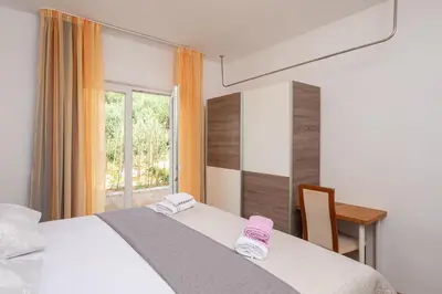 Krevet ili kreveti u jedinici u objektu Adriatic Residence
