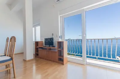 TV i/ili zabavni centar u objektu Seaside Apartments Ivo