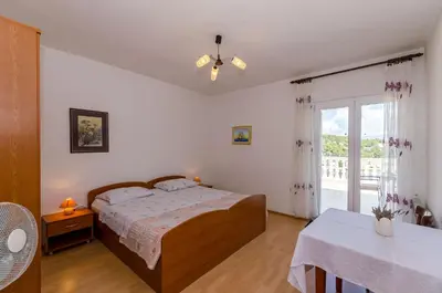 Krevet ili kreveti u jedinici u objektu Apartments Jakov